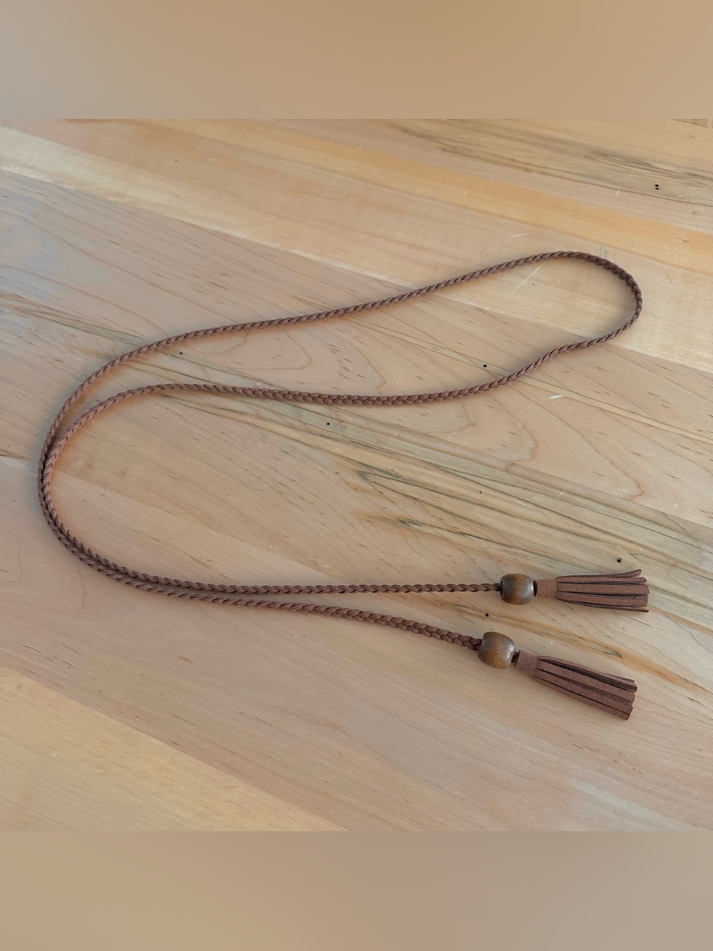 Brown braided tassel belt